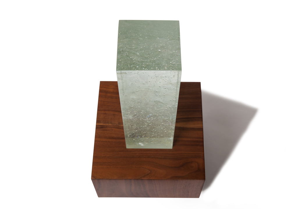 Picture of a beautiful glass and walnut wood cremation urn on sale at Muses Design Urns. Top view.